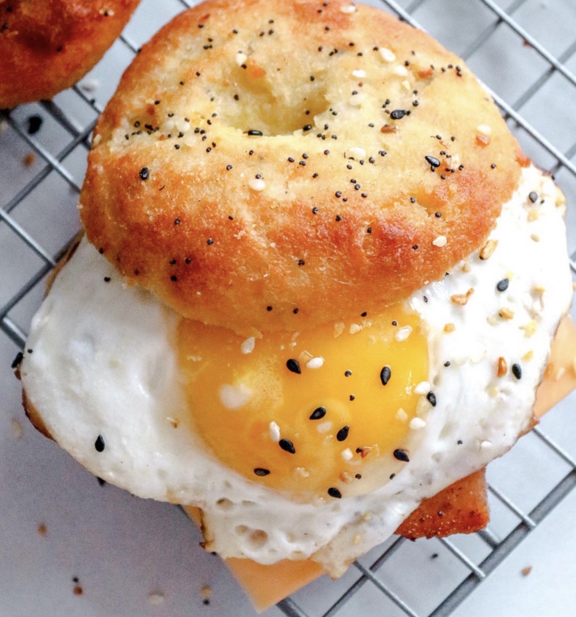Fried egg and cheese breakfast bagel